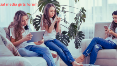 Diverse group of young women chatting and using laptops and smartphones in a social media forum.